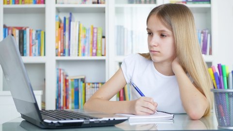 Kid Using Laptop Studying in Video Conferencing, Child Learning, Writing in Library, Blonde Girl Chatting with Teacher, Children Homeschooling, Online Education