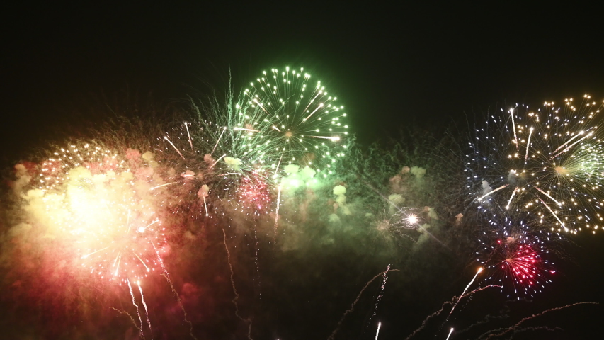 Real Fireworks display celebration, Colorful New Year Firework 4K Royalty-Free Stock Footage #1054942652