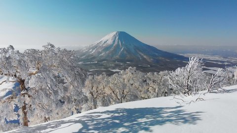 Aerial view of the snow-capped Niseko volcano in Hokkaido, Japan