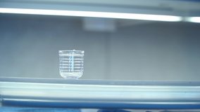 Scientist in defocus do research in medical laboratory, working with test tubes and medicines. Doctor pours liquid into beaker from syringe. - Powered by Shutterstock - Get 15% off with code: PIKWIZARD15