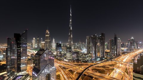 4K Timelapse - Aerial view of modern skyscrapers  and cityscape at night in Dubai.UAE