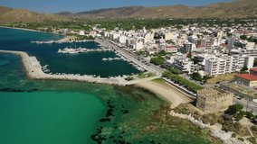 Aerial drone video of famous seaside town and port of Karistos in South Evia island, Greece
