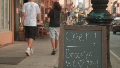 alt Open Brooklyn We Love You sign on sidewalk Brooklyn Covid reopening