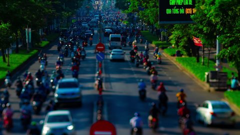 A timelapse of miniature traffic jam at the busy town tiltshift panning. Ho Chi Minh / Vietnam - 02.19.2020