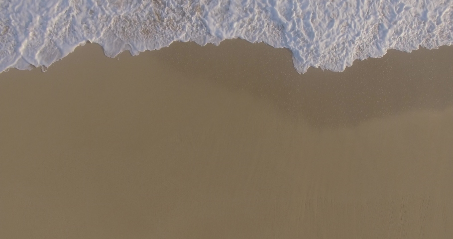 Small wave, Soft wave on sand beach for opening video, text space. white sand beach, Ocean Wave On Sandy Beach | Shutterstock HD Video #1055046596