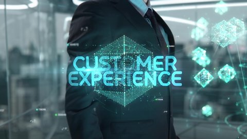 Businessman with Customer Experience hologram concept