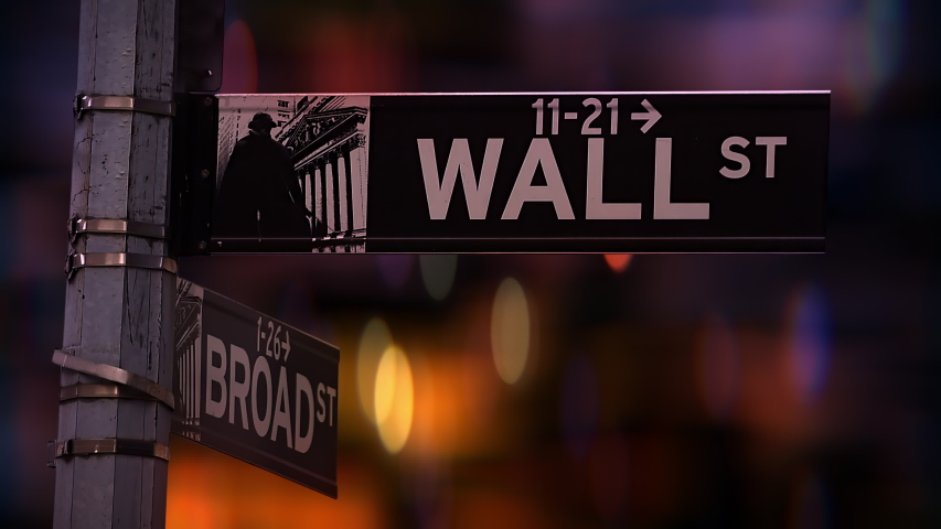 City lights defocused behind the wall street signpost in lower Manhattan, New York City, USA. Royalty-Free Stock Footage #1055076395