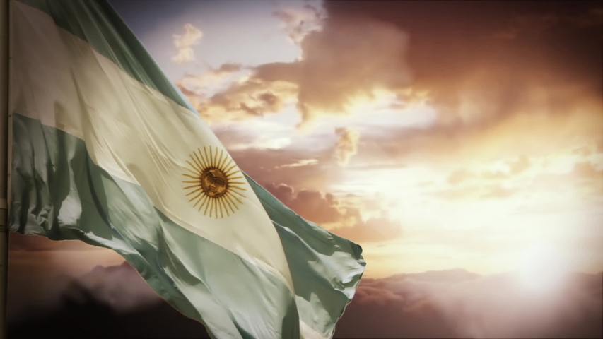 Flag of Argentina Waving Against Mountain Landscape at Sunset