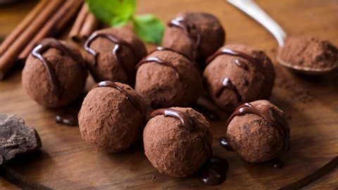 Homemade Dark Chocolate Truffles. Confectioner Pouring Chocolate Ganache Glaze On Truffles, Bonbon Candy