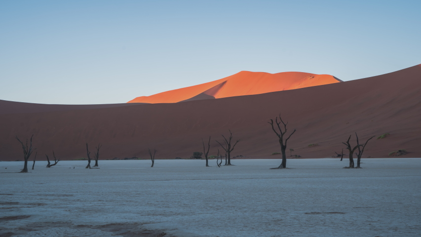 6K-30FPS-10BIT-YUV422
Namibia Sossusvlei Desert sunrise, Deadvlei sunrise, red desert sunrise Royalty-Free Stock Footage #1055094686