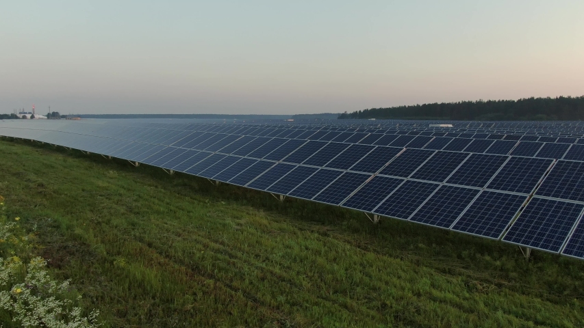 Field of solar panels during sunrise in Ukraine | Shutterstock HD Video #1055098607
