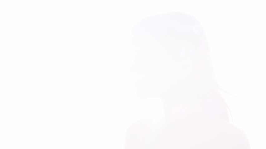 Art portrait. Inner beauty. Purple blue ink swirl in female head silhouette double exposition isolated on white.