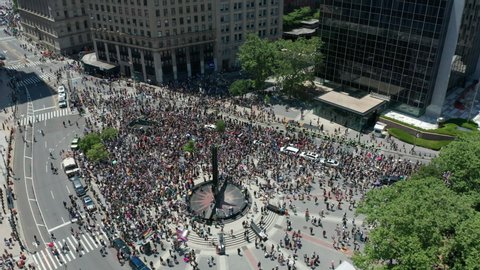 BLM demonstration in Foley Square NYC flying backward and tilting up to skyline