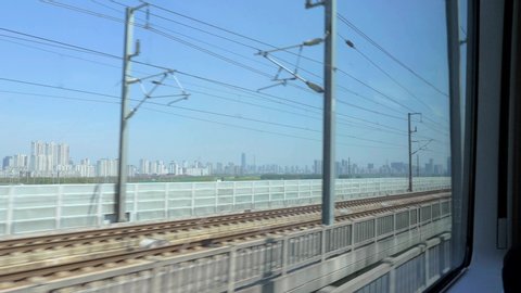 Chinese high speed train. View outside window of High Speed Train driving at 350 km/h