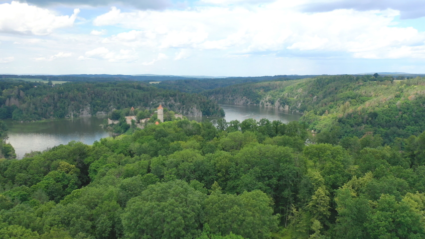 Aerial view on czech medieval castle Zvikov, situated on rocky outcrop above the confluence of two rivers Vltava and Otava in Czech republic