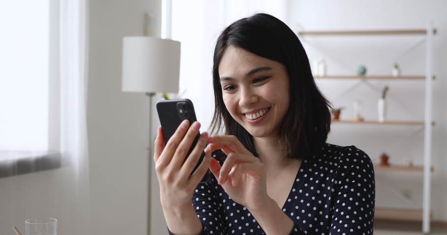 Asian woman spend free time in internet social media, employee note on calendar event, take break have fun use virtual services, chat in e-date website, text email, enjoy distant communication concept | Shutterstock HD Video #1055106509