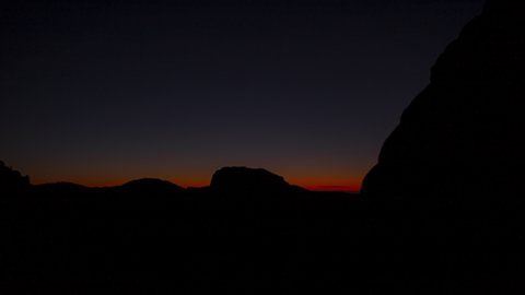 Time lapse of sunrise over rocky terrain in Sonoran Desert in Southern Arizona