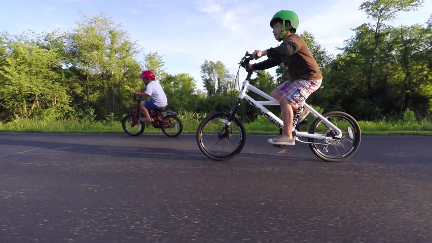 boys riding bike