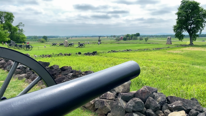 Tilt up view of American Civil War army cannons at Gettysburg battlefield during summer Royalty-Free Stock Footage #1055122247