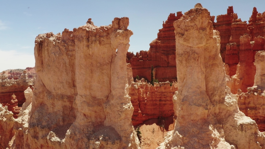 Cinematic aerial of Bryce Canyon National Park, red rocky spires, natural phenomena, landscape of another planet, scenic Utah