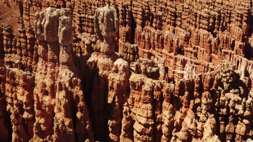 Cinematic aerial of Bryce Canyon National Park, red rocky spires, natural phenomena, landscape of another planet, scenic Utah