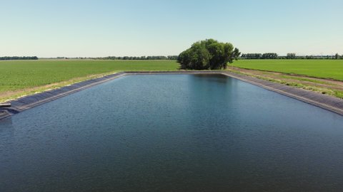 aero. water expanse above irrigation tank. water storage pool, reservoir for agricultural fields irrigation. modern technologies in farming.