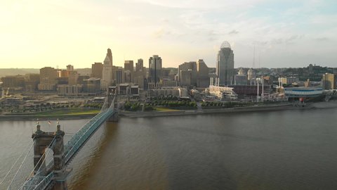 Aerial view of John A. Roebling Suspension Bridge over the Ohio River and downtown Cincinnati skyline