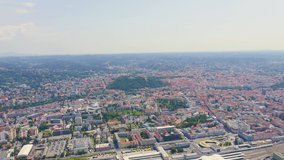 Inscription on video. Graz, Austria. The historic city center aerial view. Mount Schlossberg (Castle Hill). Glitch effect text, Aerial View, Point of interest