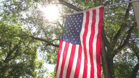 Beautiful American Flag blows in the wind in slow motion