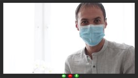 boy making a video conference with face mask