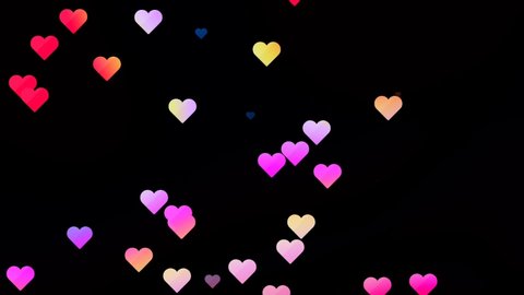 Colorful heart confetti background. Animated rain of hearts on a black background