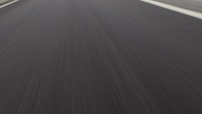 Wet asphalt , moving asphalt. Car point of view - Powered by Shutterstock - Get 15% off with code: PIKWIZARD15