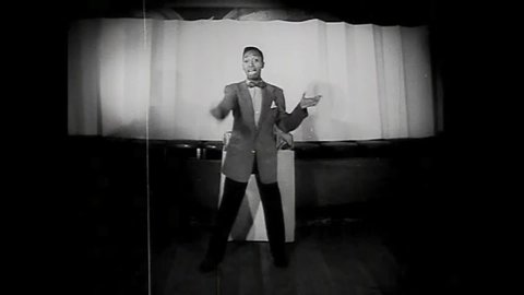 CIRCA 1946 - An African-American actor does an impersonation of Bette Davis' performance in "The Letter."
