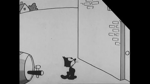 CIRCA 1928 - In this animated film, Felix the Cat watches a jiu jitsu demonstration through a whole in a theater wall.