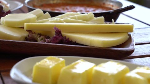 Turkish breakfast video shoot. Traditional Turkish breakfast cheese plates close-up.