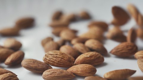 Almonds rotation on the white background - falling