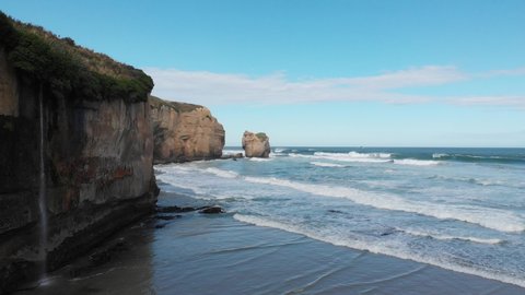 Tunnel Beach is a locality 7.5 kilometres southwest of the city centre of Dunedin, New Zealand. Located just south of St Clair, Tunnel Beach has sea-carved sandstone cliffs, rock arches and caves