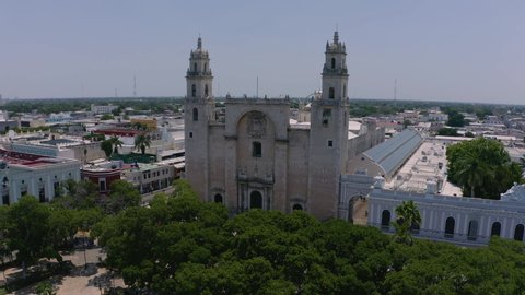 Panoramic aerial view of the central park of Merida with the San Ildefonso Cathedral in the foreground