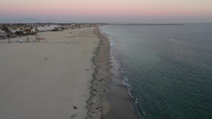 Beach aerial footage at sunset in Long Beach, CA 