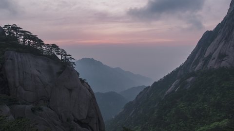 4K, 10Bit timelapse of The Huangshan mountain with clouds sea and pine trees in sunrise, Anhui, China