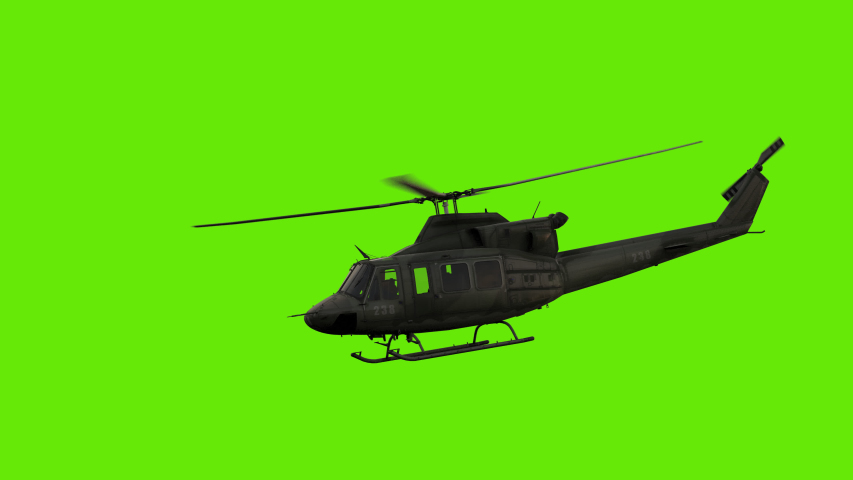Military helicopter flying green screen