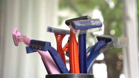 Used old dirty plastic disposable razors. Plastic pollution problem