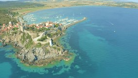 aerial view of the coastal town of Talamone in the Tuscan Maremma video edited vivid color