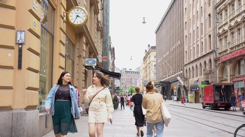 Finland, Helsinki - June 29th 2020:  Summer view of helsinki with people and tram on street in Helsinki Old Town.Helsinki is the capital city and most populous municipality of Finland