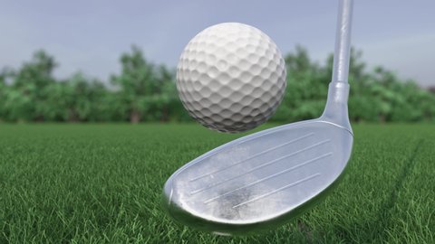 Golf club hits a golf ball in a super slow motion