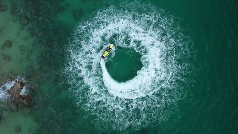 Vedio People are playing a jet ski in the sea. Aerial view and top view.amazing nature background.