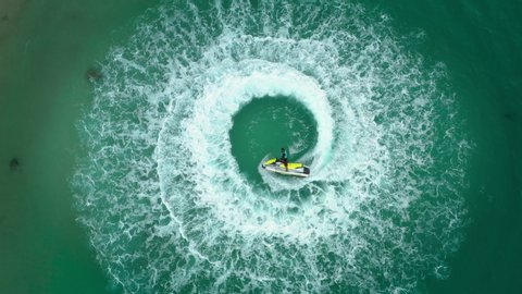 Vedio People are playing a jet ski in the sea. Aerial view and top view.amazing nature background.
