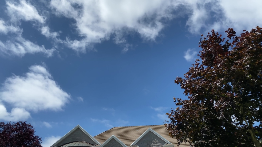 A perfect neighbourhood. Houses in suburb at Summer in the north America. Luxury houses with nice landscape.