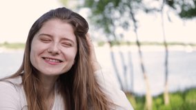 happy young attractive girl laughing outdoors