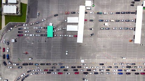 Miami Gardens, Florida, USA - July 01, 2020: Aerial view on Hard Rock Stadium Coronavirus Testing Site and Antibody Testing Spot. COVID-19 testing site, hundreds of drivers waited in line for hours.